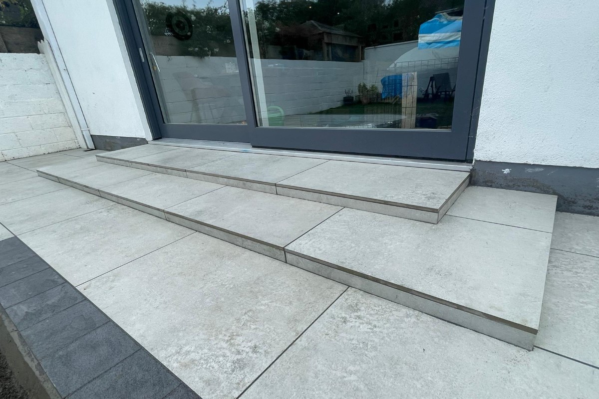 Porcelain tiling services for patios in Aghade